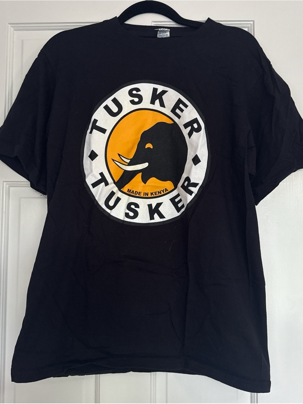 Tusker Logo Black T-Shirt with Yellow Graphic